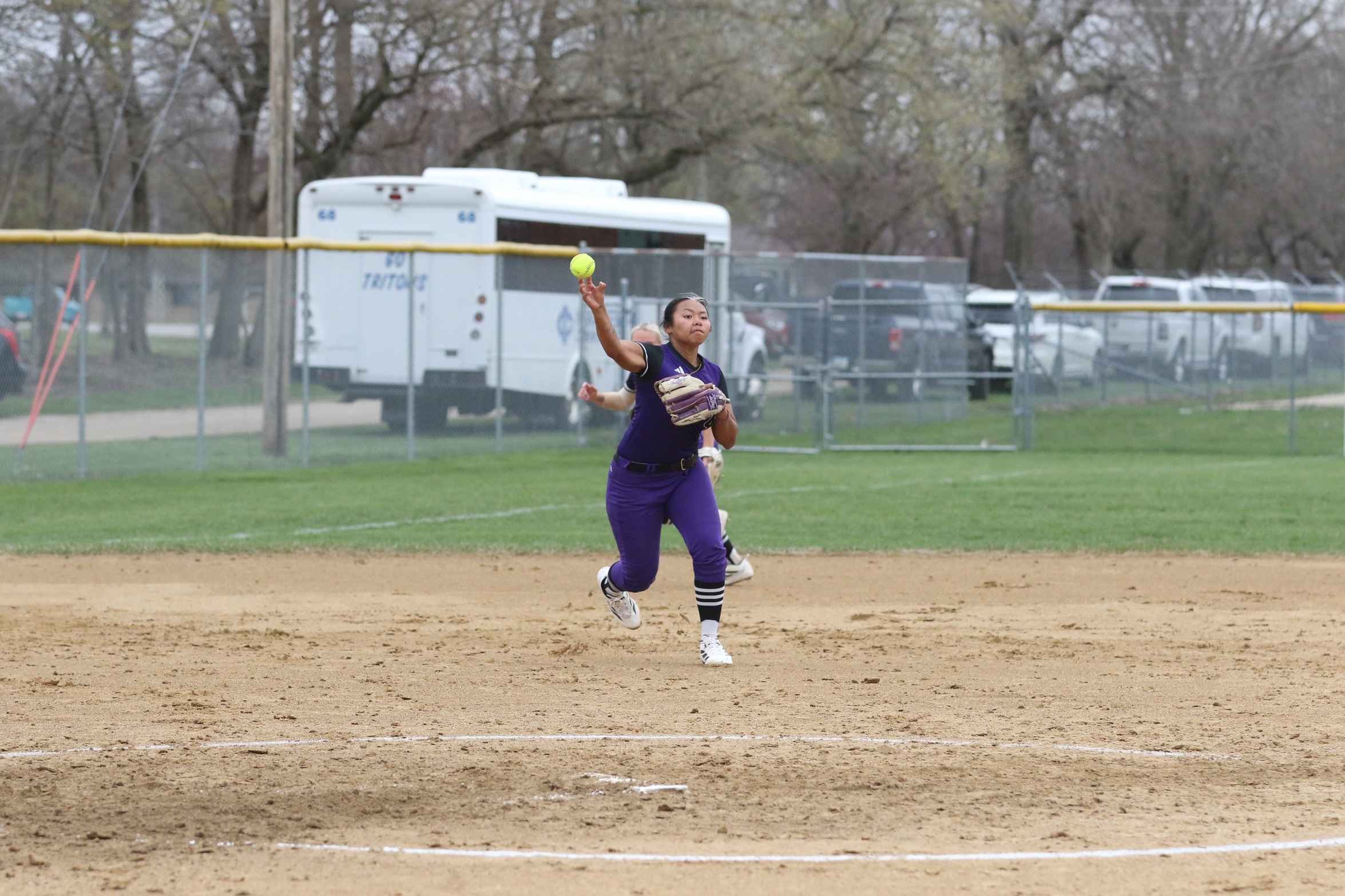 Melanie Khounsourath fires the ball to first for the out. Photo by Marissa VanWingen of The Times Citizen. 